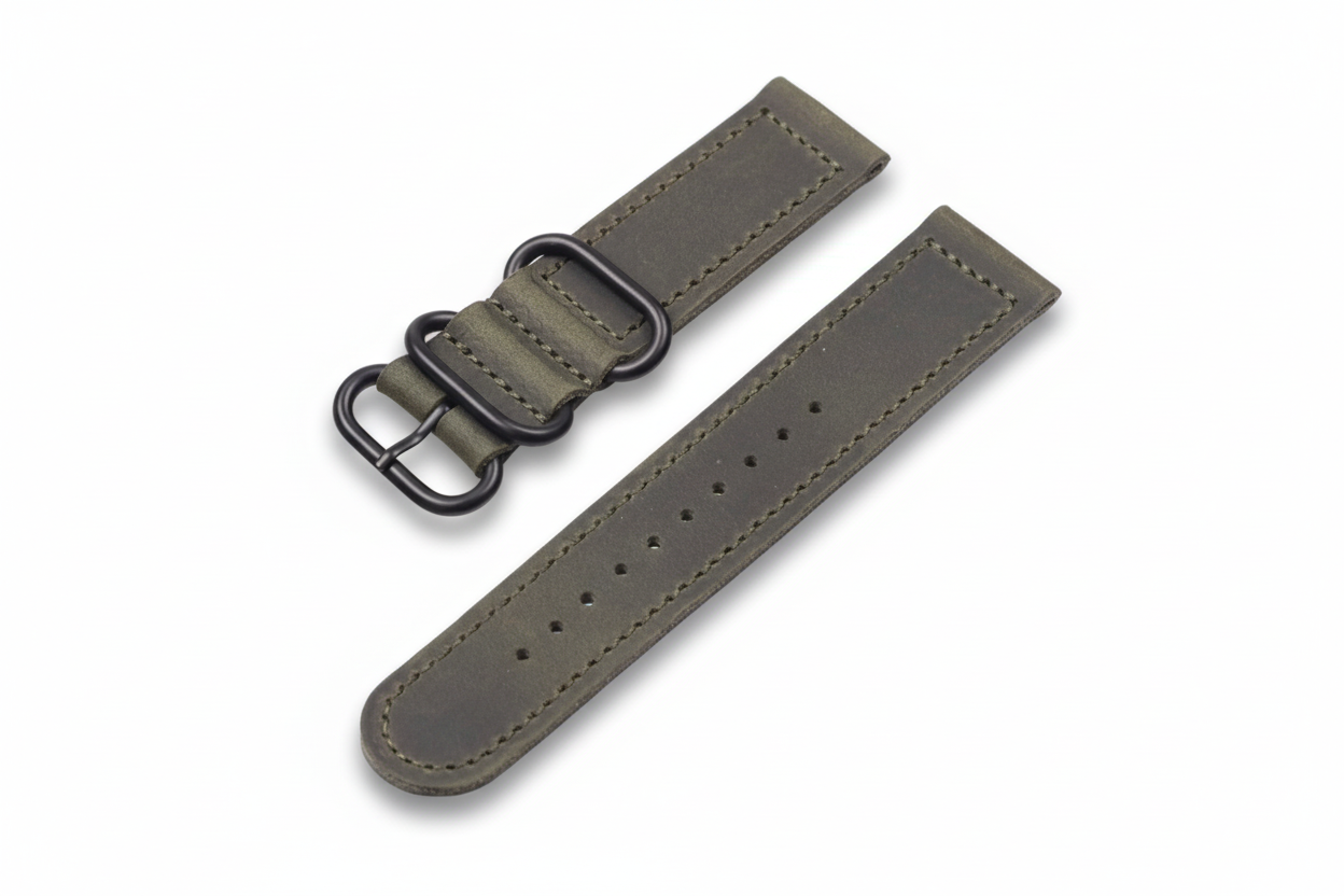 Green-Grey leather watch strap with black buckle on a white background