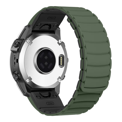 Garmin with a green band on a white background