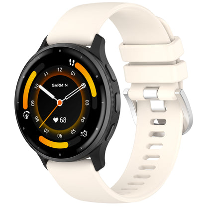garmin with a cream band on a white background